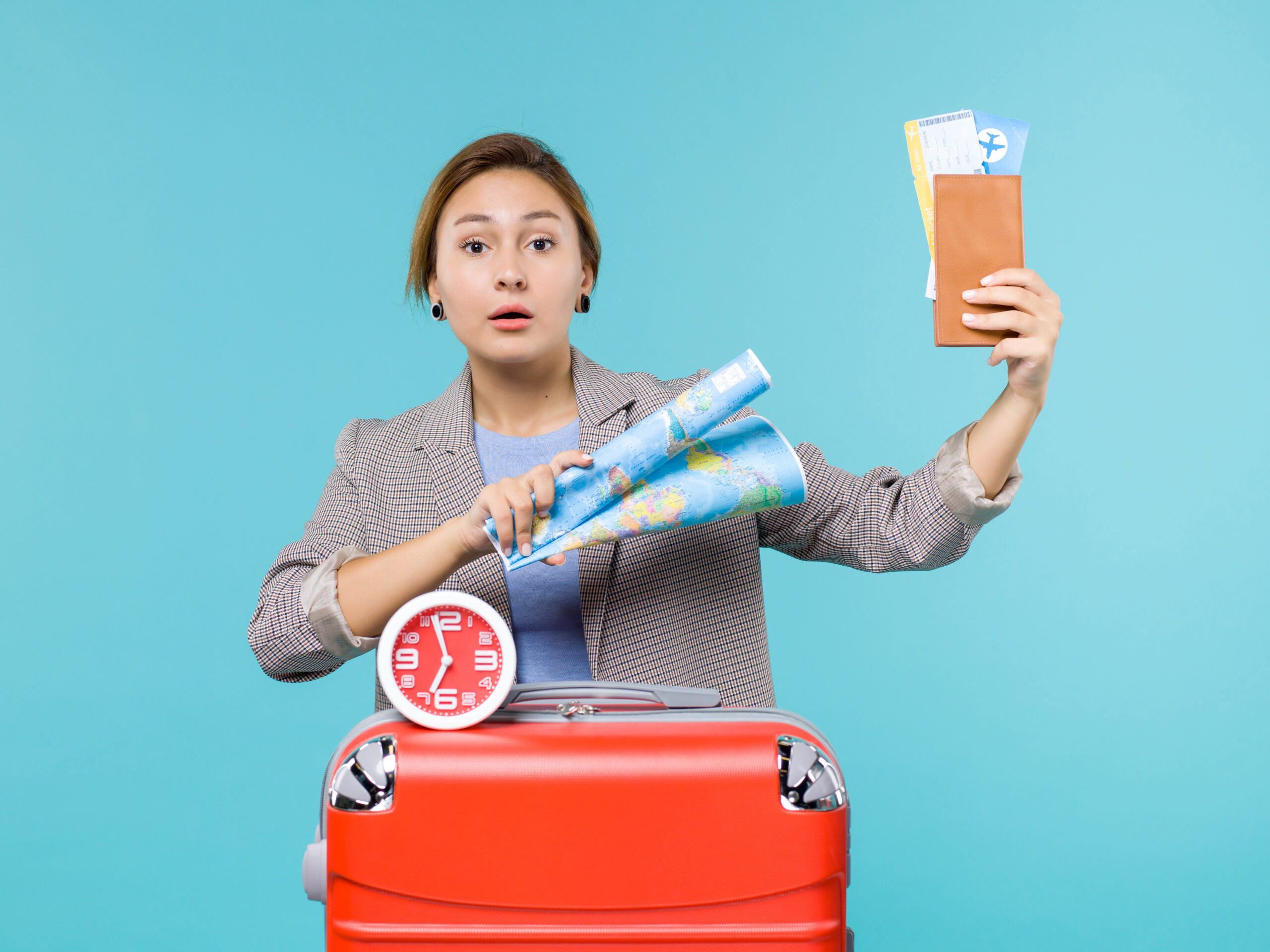 front view female vacation holding map tickets blue floor voyage journey sea trip vacation scaled